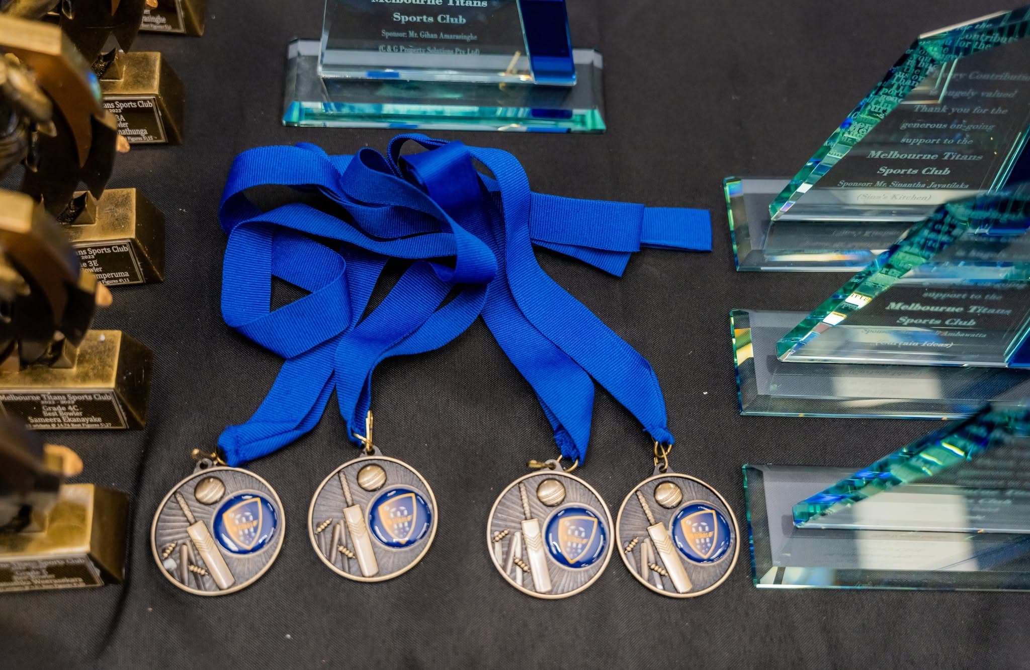 Club medals, trophies, and sponsor recognition plaques